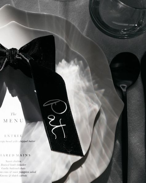 When Kayla came to me with the idea for these velvet name tags to complement what I would call a modern day black and white fairytale, how could I have said no! They were a labour of love but turned out better than we imagined 🖤 Bride @ivorybride.co Photographer @kinshipbykristy Styling / Table Hire @coeur___studio @ivorybride.co Florals little paddock_farmandflorals Menus @ivorybride.co #wedding #modernwedding #blackandwhite #stationery #weddingstationery #placecards #velvet #ribbon... Black And White Name Tags, Ribbon Name Tags, Black And White Stationery, Modern Chic Wedding, White Names, Wedding Name, Wedding Bows, Night Market, Wedding Tablescapes