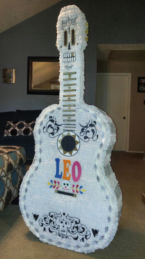 Coco guitar piñata Coco Pinata, Coco Guitar, Coco Party, Coco Birthday, Coco Disney, Minion Birthday Cake, Mexican Birthday Parties, Construction Theme Party, Piñata Ideas