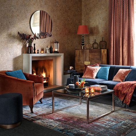 Modern-living-room-with-autumnal-auburn-scheme-and-navy-sofa Copper Living Room, Navy Living Rooms, Living Room Images, Living Room Orange, Up House, Brown Living Room, Blue Living Room, Beautiful Living Rooms, Living Room Pictures