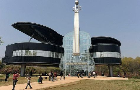 The Piano House. A music school (what else!?) in Huainan, China. Built in 2007 by architectural students at Hefei University of Technology. So cool... Dancing House, Unusual Buildings, Interesting Buildings, Lego House, Unique Buildings, Music School, Guitar Building, Unique Houses, Water Tower