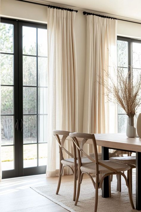 What’s the easiest way to soften your dining room? Light curtains in neutral dining room decor frame the windows beautifully while letting natural light filter in. Linen or sheer fabrics in shades like cream or light gray keep the space bright and airy. It’s such a simple addition that makes a big difference. Why not give your dining room a polished, serene look with this effortless upgrade? Neutral Dining Room Decor, Light Curtains, Neutral Dining Room, Cream Curtains, Dining Room Light, Simple Addition, Curtain Lights, Light Filter, Linen Curtains