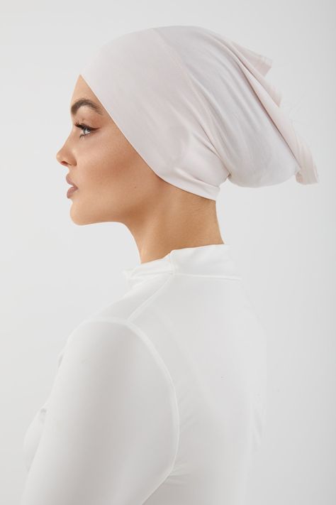 Suffer from itchy hijab caps? Say no more! Meet Farah- Our bamboo jersey undercap that is purely comfortable, soft and moisture absorbent. It features anti-static bamboo fabric that won't cling to your hijabs and is stretchable to fit all head sizes! Farah is breathable so your head does not get too hot wearing hijab. This means she's perfect to style all year long! Features: Tube Undercap Style Wide Front Stitching Bamboo Jersey Care: Machine Wash Cold. Tumble Dry Low. Due to Hygienic Reasons, White Hijab, Wearing Hijab, Matching Lounge Set, Black Hijab, Hijab Caps, Say No More, Jersey Hijab, Shes Perfect, Maxi Cardigan