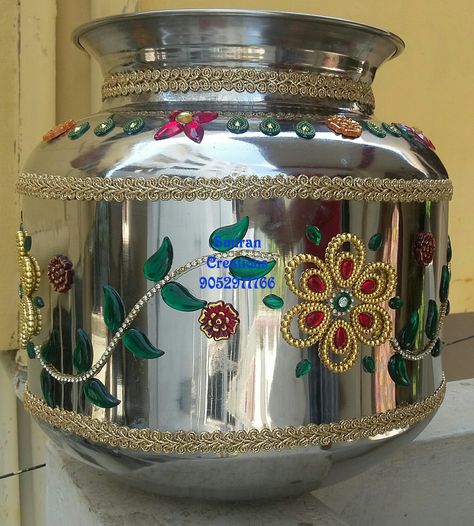 Decorated steel binde (pot) used in Telugu Marriage to find winner among wife and husband who will catch ring in the binde first. Kobbari Bondam Decoration For Marriage, Telugu Marriage, Tin Decorations, Kalash Decoration, Coconut Decoration, Wedding Embroidery Hoop, Kobbari Bondam, Thali Decoration Ideas, Wedding Gift Pack