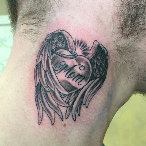 Heart With Angel Wings Tattoo donnyboudreau Mom Angel Tattoo, Angel Wing With Name Tattoo, Heart And Wings Tattoo Design, Angel Wings Tattoo For Grandma, Tattoo For Mom, Heart Angel Wings Tattoo, Heart Shaped Angel Wing Tattoo, Small Angel Wing Tattoo, Heart With Wings Tattoo