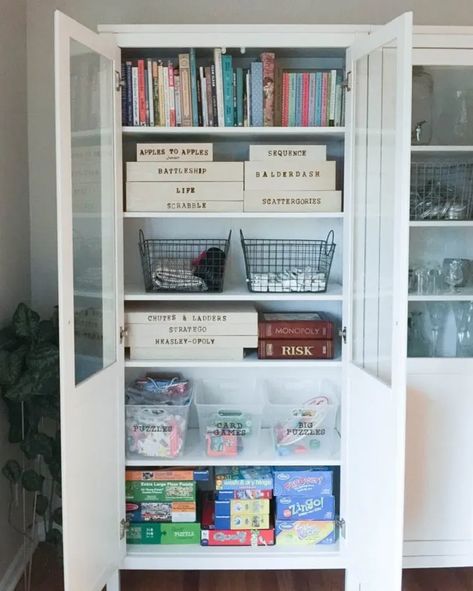 5 Smart and Stylish Board Game Storage Ideas - How To Store Board Games | Apartment Therapy Book And Board Game Storage, Game Cabinet Organization, Games Organization Ideas, Board Game Cabinet, Board Game Organization Ideas, Game Organization Ideas, Board Game Storage Cabinet, Board Game Storage Ideas, Games Organization