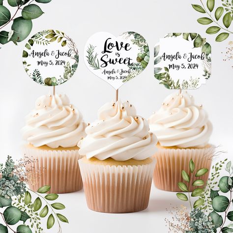 "Lovely watercolor images adorn these cupcake topper picks to add a personalized touch to your cupcakes at your event. Each topper is printed on heavy white cardstock and is attached to a natural wood pick. The layout, wording and colors on these toppers cannot be changed; only your personalization of name and date. .¸*This item is MADE-TO-ORDER; please order at least 3 weeks before your event to allow for production and delivery time within the USA. Larger orders may take longer and Rush orders may incur an additional fee. .¸ Please enter your name and event date in the personalization box so that we may be sure to have your items arrive in plenty of time for your event. Each cupcake topper measures 1.75\" by approximately 4.5\" tall including the natural wood stick. *You May Also Like th Wedding Cupcake Toppers, Cupcake Picks, Wedding Leaves, Watercolor Images, Wedding Favor Tags, Wedding Cupcakes, Cupcake Topper, Greenery Wedding, Wedding Cake Toppers