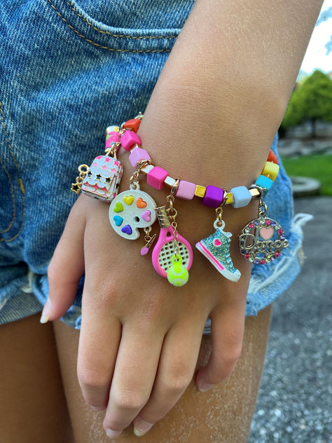 Build your own bracelet with charms of your favorite activities! Inside Out Toys, Gold Glitter Nail Polish, Charm Bar, Sports Girl, Bracelet With Charms, Unicorn Charm, Gold Glitter Nails, Charms For Bracelets, Diy Charm Bracelet