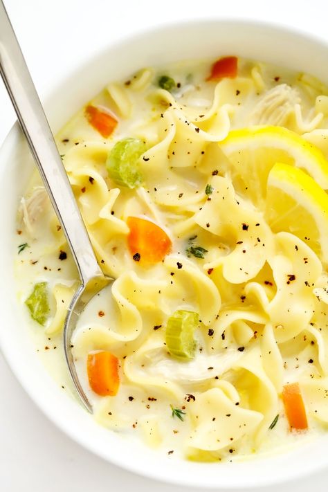 This creamy lemon chicken noodle soup is made with all of the classic ingredients we all love and a cozy creamy broth that's brightened up with lots of fresh lemon juice and thyme.  So comforting and delicious! | gimmesomeoven.com #chicken #noodle #soup #creamy #lemon #dinner #winter #onepot #healthy Chicken Noodle Soup Lemon, Creamy Lemon Chicken Noodle Soup, Creamy Lemon Soup, Chicken Noodle Soup With Lemon, Lemon Chicken Noodles, Creamy Lemon Chicken Soup, Chicken Noodle Soup Creamy, Lemon Chicken Noodle Soup, Chicken Noodle Soup Can