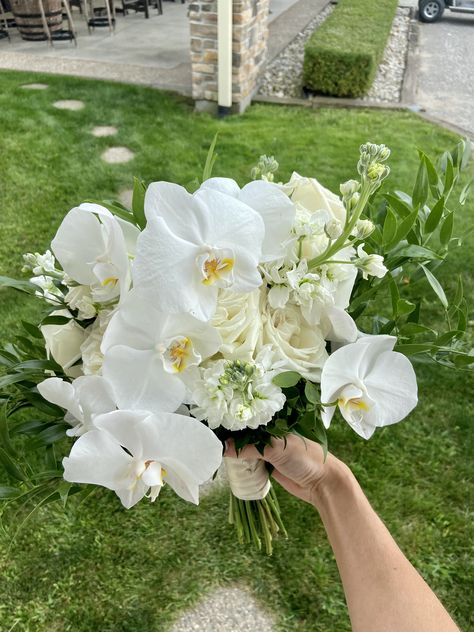 Italian Ruscus, loose deconstructed shape – Hand Tied. At Mastronardi Estate Winery. Florals by Thiessans The Flower Shop. #wedding #weddingday #weddingflowers #bridalbouquet #orchid #roses #ranunculus #winery #kingsville #ontario #canada Flower Shop Wedding, Kingsville Ontario, Bouquet With Roses, Italian Ruscus, Phalaenopsis Orchid, White Bouquet, Shop Wedding, Ranunculus, Ontario Canada