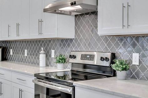 Kitchen with gray arabesque tile backsplash Arabesque Tile Shower, Arabesque Tile Backsplash Kitchen, Arabesque Tiles, Arabesque Backsplash, Arabesque Tile Backsplash, Kitchen Renos, Kitchy Kitchen, Backsplash With White Cabinets, Brick Backsplash Kitchen