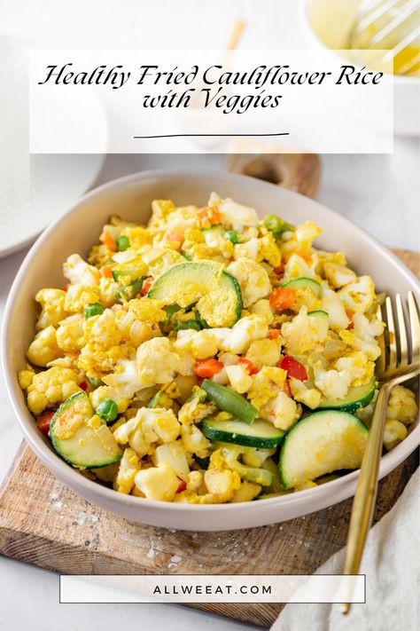 Healthy Fried Cauliflower Rice with Veggies – A delicious and nutritious low-carb recipe that’s quick to prepare! Made with riced cauliflower, fresh vegetables, and your favorite seasonings, it’s perfect as a side or light main dish. Ready in under 30 minutes and packed with flavor and nutrients. Gluten-free, vegan-friendly, and ideal for meal prep. #CauliflowerRice #HealthyDinner #LowCarbMeals #VeggieLovers #QuickRecipes Ground Beef Stuffed Zucchini, Rice With Veggies, Fried Cauliflower Rice, Cauliflower Side Dish, Zucchini Crisps, Roasted Cauliflower Steaks, Riced Cauliflower, Frozen Cauliflower Rice, Cauliflower Rice Recipes