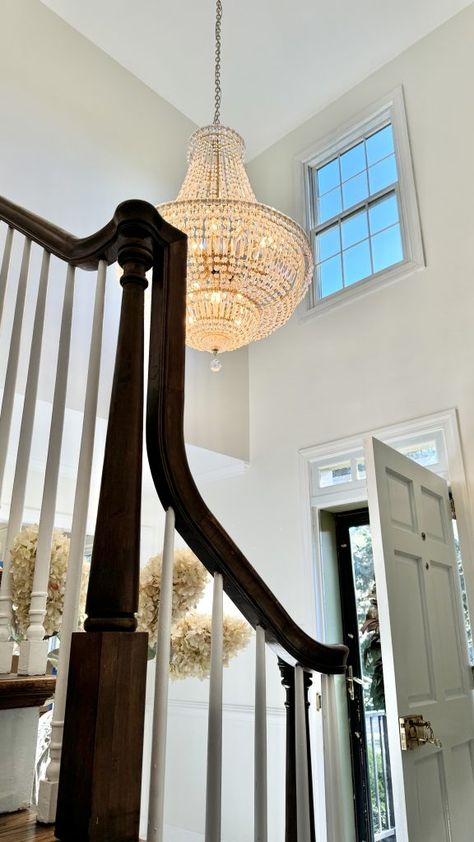 How to Hang a Chandelier in Your Two-Story Foyer: A Detailed Tutorial | Classically Jill Tall Ceiling Foyer, Entry Way Chandelier High Ceilings, Tall Entryway Ideas, Tall Entryway Ideas High Ceilings, Two Story Foyer Decor, 2 Story Foyer Lighting, Foyer Chandelier 2 Story, Two Story Foyer Lighting, Entry Way Chandelier