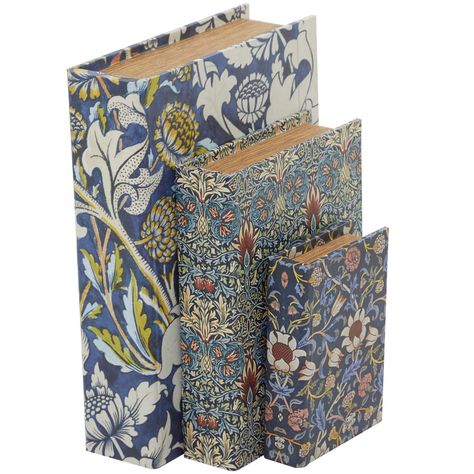 "Find the Blue Floral Canvas Faux Book Box Set at Michaels. com. This decorative book box set is constructed from MDF wood and canvas for a durable design. This decorative book box set is constructed from MDF wood and canvas for a durable design. This stack of 3 faux books features hidden storage compartments in various sizes that can be used for organization or fillers on bookcases and shelves. Details: Blue 3 book boxes MDF wood and canvas For indoor useSize Information: 9\" x 3\" x 12\" book Trinkets Jewelry, Photo Box Storage, Book Boxes, Traditional Books, Wooden Books, Yellow Paper, Red Wood, Floral Canvas, Leather Box