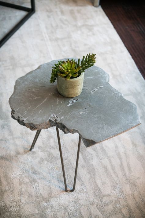 "Concrete end table...a table that is completely unique, our concrete \"wood-slice\" table was engineered to replicate just that, but with a more conscious mind. Whether in a minimalist loft or contemporary home, it's sure to attract the attention of guests. Using a proprietary blend of polymers we've been able to mold real wood slices and reproduce them with every single detail but in concrete.  And the concrete isn't that heavy stuff you think of when someone says concrete. This is a special m Wood Slice Table, Concrete End Table, Cement Furniture, Tree Stump Table, Table Tree, Table Minimalist, Stump Table, Minimalist Table, Table Live Edge