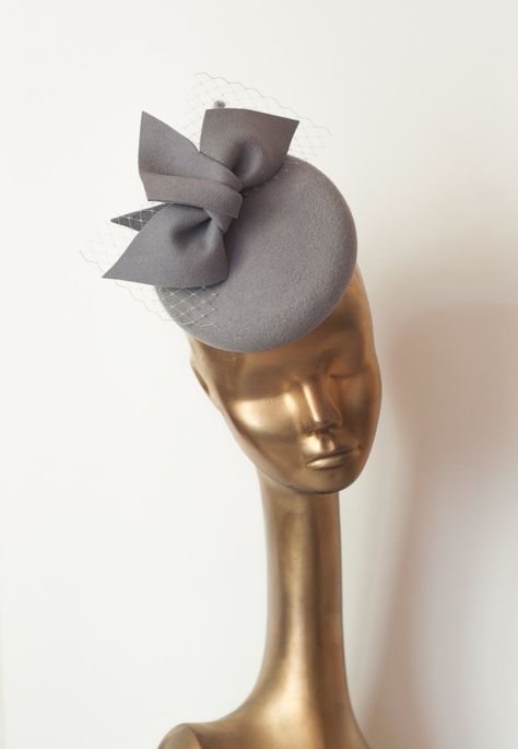 Please note that all items in my shop are made to order Unique Modern Gray Felt Fascinator. For parties and outdoors. Can be mounted on headband or with elastic rubber. Diameter : 16 cm Finished with lining and delicate petersham cotton grosgrain ribbon. Please send me.convo after purchase. There are many positions you can wear it. If you need any info please contact me :) --------------------------- SHIPPING INFORMATION I will ship your purchased item within 3 business days after receiving paym Felt Fascinator, Grey Fascinator, Idda Van Munster, British Hats, Mini Hats, Couture Hats, Head Pieces, Wedding Fascinators, Elegant Hats