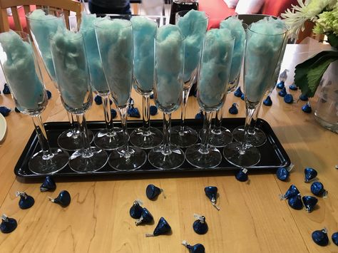 Baby shower idea from my baby shower. Champagne flutes with cotton candy in them. When you fill with champagne the the candy melts and you have a blue glass of champagne. You can do this with pink cotton candy too. #babyshower #babymulrooney Blue Cotton Candy Champagne, Candy Centerpiece, Cotton Candy Champagne, Champagne Punch, Tiffany Bridal Shower, Blue Shots, Sneaker Ball, Tiffany's Bridal, Blue Cotton Candy