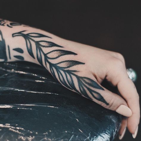 Small Black Filler Tattoo, Traditional Greenery Tattoo, Leaf Tattoo On Arm, Long Gap Filler Tattoo, Traditional Leaf Tattoo, Leaf Tattoo Men, Hand Tattoos Traditional, Traditional Tattoo Leaves, Outer Wrist Tattoo