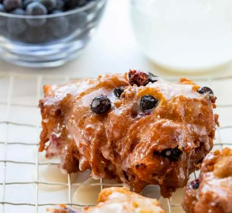 Fresh Blueberry Fritters that are made with a cakey batter incorporated with fresh blueberries are the ultimate homemade treat! Homemade Fritters, Fritters Recipe, Blueberry Fritters, Fresh Blueberry Fritters, Breakfast, How to Make Fritters, Donuts, Recipes, Fried Fritters, i am baker, iambaker Blueberry Fritters Recipe, How To Make Fritters, Blueberry Fritters, Fried Fritters, Blueberry Sweet Rolls, Blueberry Lemon Scones, Donuts Recipes, Banana Fritters, Lemon Scones