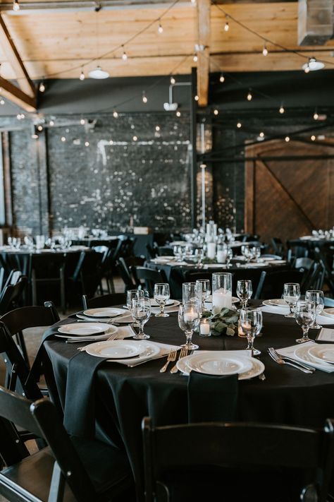 White Plates With Black Napkins Wedding, Black Table Cloth Place Setting, Black Satin Tablecloth Wedding, Black Tablecloth With White Napkins, Black Table Cloth Wedding Greenery, Wedding Tablescapes Black Tablecloth, Black Round Tablecloth Wedding, Black Tablecloth Wedding Receptions, Diy Black Wedding Decor