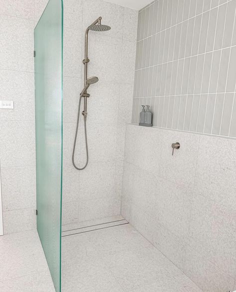 @thehomelyhub has created such a calm and inviting bathroom. Using a combination of our Paddington in white terrazzo tile (that’s made here in Australia) and our Newport’s in sage green. Behind the vanity they did VJ panels that brings the whole look together. Such a great family bathroom design ❤️ Bathroom With Green Subway Tile, Sage Subway Tile Bathroom, Vj Bathroom, Sage Green And White Bathroom, Sage Green Bathroom Tiles, Terrazo Tiles Bathroom, Green Terrazzo Bathroom, White Terrazzo Bathroom, White Terrazzo Tile