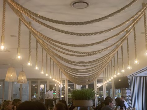 Ceiling Decor Restaurant, Rope Ceiling Design, False Ceiling For Restaurants, Resturant Celling Ideas, Rope Ceiling Design Restaurant, Bali Beach House, Coffee Snacks, Welded Furniture, Sun Lounge