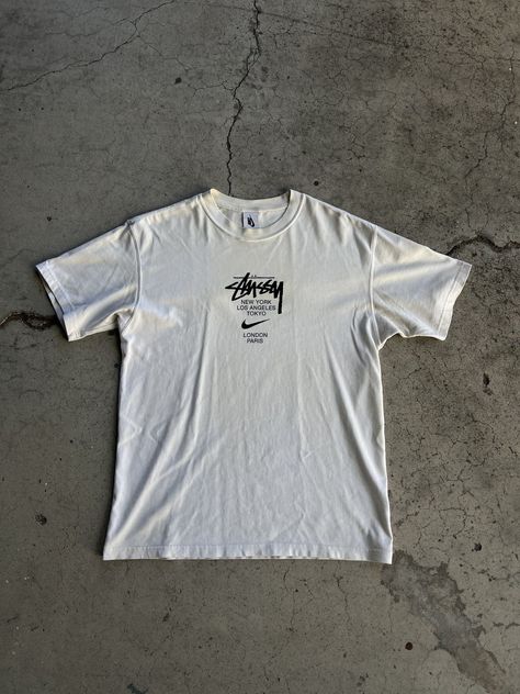 Nike x Stussy International Tee Stussy T Shirt, Stussy Clothing, Streetwear Wallpaper, Stussy Shirt, Stussy Tee, Nike X Stussy, Stussy Men, Paris Tee, Vintage Outfit