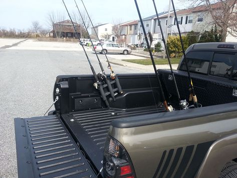 http://rotopax.com/Toyota-Nissan-Tru...ack-Mount.html Truck Fishing Rod Holder, Fishing Pole Holder Diy, Diy Fishing Pole, Diy Fishing Rod Holder, Toyota Surf, Fishing Rod Carrier, Fishing Pole Storage, Diy Fishing Rod, Tacoma Accessories