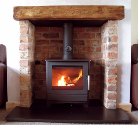 Arched Brick Fireplace, Wood Stove Hearth, Wood Burner Fireplace, Wood Burning Stoves Living Room, Log Burner Living Room, Cottage Fireplace, Minimalist Living Room Decor, Wood Stove Fireplace, Brick Chimney