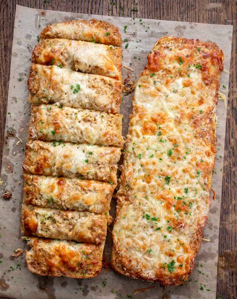 French Onion Garlic Bread is a delicious and unique appetizer made with ciabatta bread topped with garlic butter, French onion sauce, and glorious cheese! The bread is baked in the oven until the cheese is melted and golden brown. It is a tasty blend of sweet, savory, and creamy flavors that will make you crave another bite. I absolutely LOVED this bread! Plus, you can even make this bread in an air fryer! Onion Garlic Bread, Homestead Recipes, Unique Appetizers, Onion Bread, Carmelized Onions, Garlic Bread Recipe, Onion Sauce, Ciabatta Bread, Bread Serving