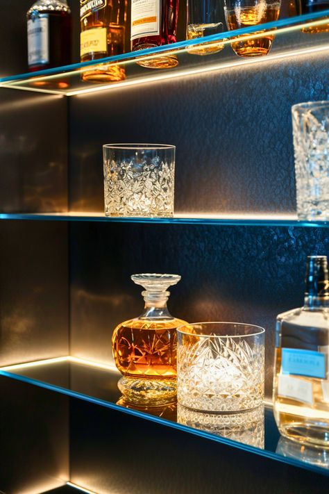 Want to make your home bar shine? Tempered glass bar shelves paired with LED lighting create a glowing, elegant display for your bottles and glassware. I’m all about the modern and airy feel this setup adds to any home bar. It’s perfect for tiny home bars or modern living rooms where you want to make a statement. Why not add a touch of glam to your bar area? Glass Bar Shelves Ideas, Glass Shelves Bar, Ideas With Led Lights, Home Bar Shelf, Glass Bar Shelves, Floating Bar Shelves, Bar Shelf Ideas, Small Bars For Home, Home Bar Setup