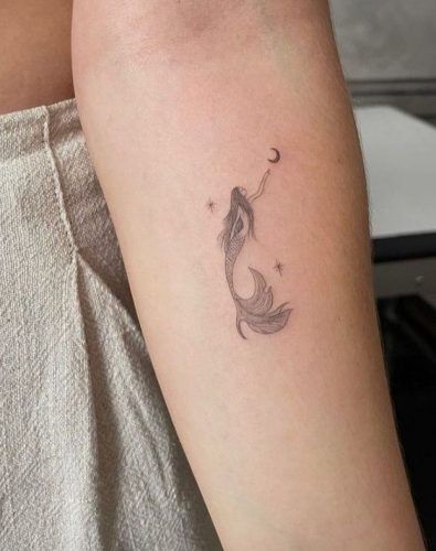 Discover Enchanting Small Mermaid Tattoos - Top 15 Designs for a Magical 2024 Mermaid Tattoo Placement, Whimsical Mermaid Tattoo, Mermaid Tattoo Aesthetic, Mermaid Ankle Tattoo, Tiny Mermaid Tattoo, Simple Mermaid Tattoo, Small Mermaid Tattoo, Mermaid Sleeve Tattoos, Beach Inspired Tattoos