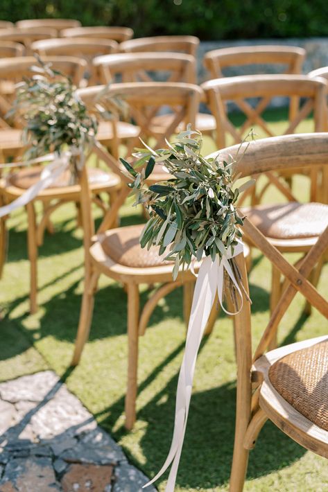 “Ethereal Mediterranean” Wedding Theme. Ceremony: Villa Vigli. Reception: AF Lindia. Lindos Rhodes Island Greece. Colors: White, Yellow & shades of Green. Greek Destination Wedding Planned by Golden Apple Weddings. Bride & Groom Wedding Portraits. Couple’s Wedding Photoshoot #weddingtheme #weddingdecor #weddingevent #weddingphotography #weddingplanning #destinationweddings #Greece #Rhodes #island #Lindos #villa #garden #ceremony #xbackchairs #woodenchairs #aisle #chairbouquet #oliveleaves #setup Apple Green Wedding Theme, Mediterranean Wedding Ceremony, Olive Green Wedding Theme, Villa Wedding Ceremony, Mediterranean Wedding Theme, Greek Wedding Theme, Olive Green Wedding, Rhodes Island Greece, Lindos Rhodes