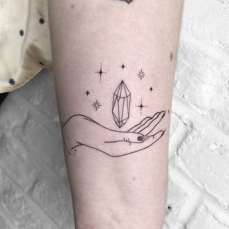 Hand-poked hand and crystal tattoo on the left arm Crystal Tattoos, Tiny Tattoos For Women, Paris Tattoo, Gem Tattoo, Typography Tattoo, Astrology Tattoo, Crystal Tattoo, Dibujos Tattoo, Hand Poked Tattoo