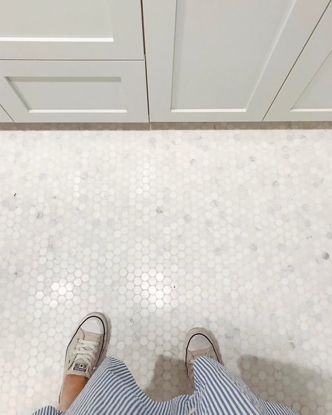 If I had a tile-of-the-month club this Carrara penny tile would be June's tile. It looks so pretty installed and adds texture without looking busy. (And yes I wear converse w skirts) Btw, this floor is in the #chancellorcircle project and it's looking so great as it comes together. Remember it's for sale! (Foothill area of Salt Lake) #whiteandgolddesign @jonbrown5 @duhrail_t White Penny Round Tile Bathroom Floor, White Penny Tile Bathroom, Penny Round Tile Bathroom, Penny Tile Bathroom, Penny Tile Bathroom Floor, Classic Bathroom Tile, Penny Tiles Bathroom, Penny Tile Floors, Penny Floor