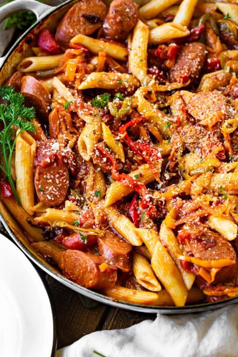 This skillet Italian sausage and peppers with whole-wheat penne is the perfect home cooked meal and it's all in #onepot which makes clean up a breeze! #italiansausage #sausageandpeppers #penne Mild Italian Sausage Recipes, Sweet Italian Sausage Recipes, Pasta With Italian Sausage, Sausage And Peppers Pasta, Italian Sausage And Peppers, Penne Recipes, Sausage Peppers And Onions, Oh Sweet Basil, Italian Sausage Pasta