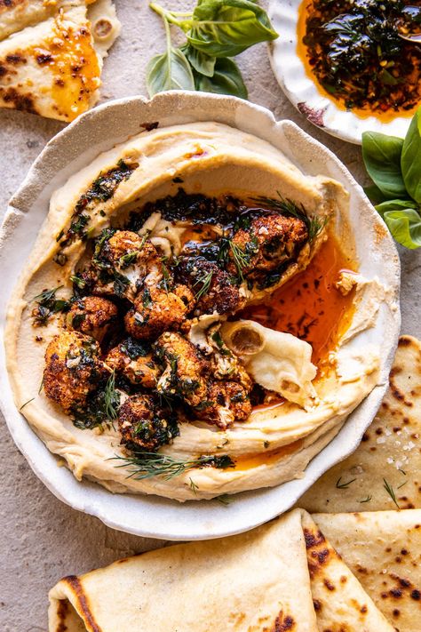 Crispy Roasted Cauliflower Hummus | halfbakedharvest.com Crispy Roasted Cauliflower Hummus Half Baked Harvest, Hummus Cauliflower, Roasted Cauliflower Pita, Roasted Cauliflower And Feta Dip, Fall Hummus, Crispy Roasted Cauliflower, Roasted Cauliflower Hummus, Pesto Roasted Cauliflower, Cauliflower Hummus