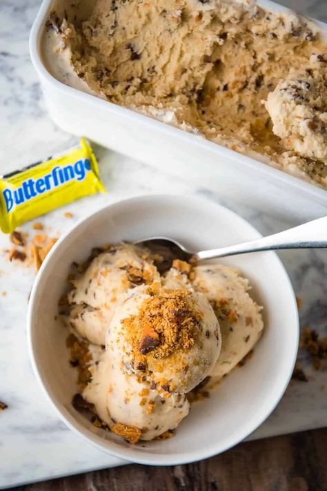 Mix and freeze an easy recipe for homemade butterfinger ice cream that's oh so creamy and rich, full of buttery vanilla flavor, and filled to the gills with crushed chocolate Butterfinger candies. It's a family favorite homemade ice cream recipe. Butterfinger Ice Cream Recipe, Homemade Butterfinger Ice Cream, Butterfinger Ice Cream, Homemade Ice Cream Recipes Machine, Homemade Ice Cream Recipe, Ice Cream Taco, Homemade Peach Ice Cream, Ice Cream Recipes Machine, Peach Ice Cream