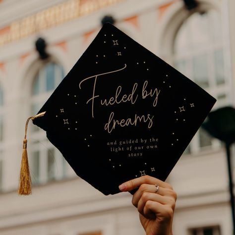 Elegant black and gold celestial stars graduation cap design with the quote "Fueled by dreams and guided by the light of our own stars." Stars Graduation Cap, Quote Graduation Cap, Country Graduation, Graduation Hat Designs, Graduation Cap Tassel, Inspirational Graduation Quotes, College Grad Cap Ideas, Masters Graduation, Graduation Cap Decoration Diy