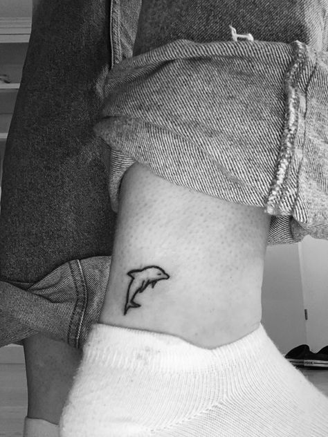 Dolphin Tattoo On Ankle, Dolphin Wrist Tattoos For Women, Tiny Dolphin Tattoo, Dolphin Tail Tattoo, Minimalist Dolphin Tattoo, Small Dolphin Tattoo, Dolphin Tattoo Meaning, Dolphin Tattoos, Winnie The Pooh Tattoos