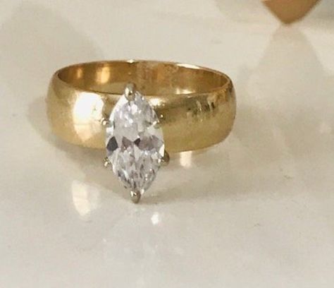 Vintage 10 K Gold Engagement Ring, 1 Carat ZC Marquise Cut Ring, Women's Ring, Zirconia Faceted Ring, Gift for her, Estate Jewelry, Size 7 You are looking at gorgeous Marquise 10 K gold Cz engagement ring, wedding band, or anniversary. The ring features a 10 x 5 mm (1 Carat) brilliant Marquise cut. Top quality AAA Cubic Zirconia display amazing enriched clarity just like real diamonds! This gorgeous ring sparkles a lot!! size: 7 stone size: 10 mm x 5 mm the height of the setting: 7 mm weight: 5. Marquise Diamond Ring Small, Thick Gold Band Marquise Diamond, Vintage Ring Setting, Gold Engagement Ring With Thick Band, Chunky Gold Band Engagement Ring, Smooth Engagement Ring, Punk Engagement Rings, Marquise Thick Band, Art Deco Marquise Ring