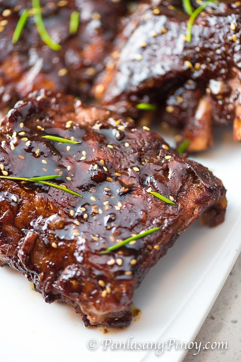 Asian BBQ Pork Baby Back Ribs are super tender fall off the bone spare ribs with an Asian twist. The sauce is composed of Hoisin and other ingredients Slow Cook Pork Ribs, Asian Bbq Pork, Pork Baby Back Ribs, Asian Ribs, Slow Cooked Ribs, Super Bowl Menu, Asian Bbq, Asian Pork, Pork Rib Recipes