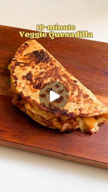 easy recipes • Aishwarya Marwal on Instagram: "10 MIN VEGGIE QUESADILLA ❤️✨

This is my quick and easy veggie quesadilla recipe! You can use whatever veggies you have on hand. It’s super easy, tastes so good and takes less than 10 mins to make. 

All you need : 

2 roti 
Choice of veggies 
1 tbsp Schezwan sauce 
Mixed herbs 
Salt to taste 
Red chilli flakes 
Cheese 

Slice it and serve hot! ❤️✨

Save this reel and try again later ✨

Follow @whataisheats for more recipe ideas ✨

#quesadilla #quesadillas #quickmeals #quickrecipes #easyrecipes #dinnerdate #dinnerideas #reelsinstagram #reelsvideo" Quesadilla Recipes Vegetarian, Veggie Quesadilla Recipes, Veggie Quesadilla, How To Make Quesadillas, Schezwan Sauce, Cheese Slice, Quesadilla Recipe, Easy Veggie, Quesadilla Recipes