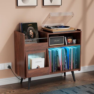 【Record Player Stand with Power Outlet and USB Ports】The vinyl record storage with 2 standard plug outlets and out power 2 USB ports *10W, which is convenient to provide power to your record player and other devices. It's the perfect blend of modernity and romance. | Hokku Designs Audio Cabinet 1.0 W in Wood / Manufactured Wood in Brown | 1" W | Wayfair Record Player Setup Aesthetic, Record Player Stand Aesthetic, Guitar Room Man Cave, Record Player Furniture, Vinyl Player Stand, Vintage Record Player Cabinet, Stereo Setup, Record Player Setup, Record Shelves