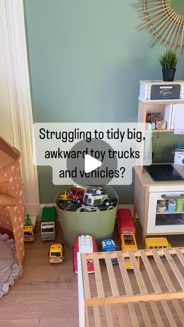 Toy Train Storage Ideas, Big Toy Car Storage Ideas, Truck Storage Ideas Toy, Living Room Toy Organization Ideas, Large Toy Car Storage Ideas, Kids Truck Storage, Storing Toy Trucks, Toy Car Organization Ideas, Bruder Truck Storage