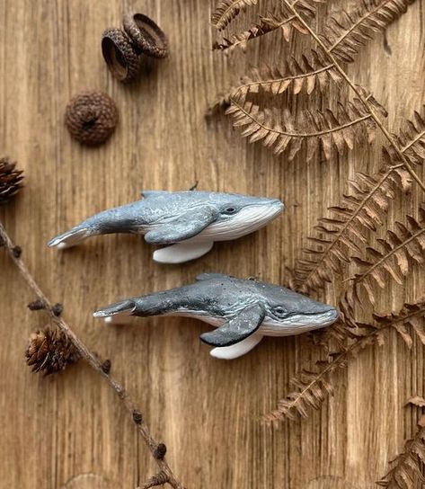 Handmade animal figurines | nature art🪺 on Instagram: "🐋Handmade whale necklaces/ornaments! These are some of my favorite creatures on Earth🥰 There are only two of them and they are a little different colors. And they look great as an addition to a light shirt and a cozy sweater☺️. Both are available in my online shop. Click on the link in my BIO🐋✨🌊 And happy Sunday, my dear friend 🤗" Whale Necklace, Whale Art, Resin Ideas, My Dear Friend, Diy Clay Crafts, Hand Painting Art, Animal Figurines, Cozy Sweater, Diy Clay