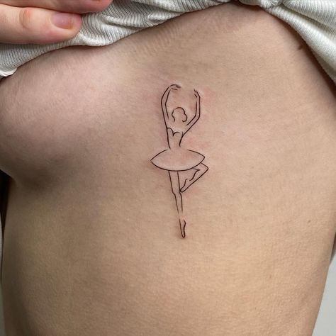 Ballerina tattoo on pale skin Ballerina Minimalist Drawing, Tiny Ballet Tattoo, Fine Line Ballerina Tattoo, Ballerina Tatoos, Dance Tattoos Small, Dance Inspired Tattoos, Ballerina Tattoo Small, Ballet Tattoo Minimalist, Tiny Dancer Tattoo