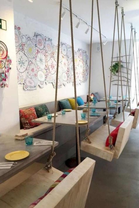 Check out this indoor swing inspiration in a modern restaurant! Colorful decor, contemporary design and graphic patterns really enrich the restaurant interior design. Restaurant Seating Design, Café Design, Hanging Chairs, Cafe Seating, Decoration Restaurant, Restaurant Seating, Coffee Shops Interior, 카페 인테리어 디자인, Best Coffee Shop