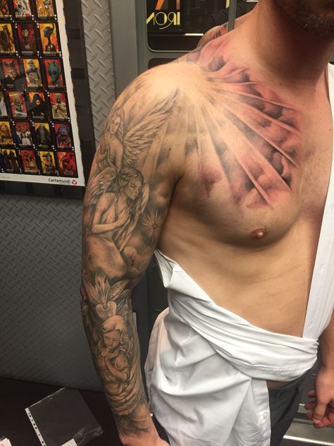 Chest Tattoo Background Ideas, Light Tattoo Sleeve, Light Shaded Tattoo, Cloud Chest Tattoo Men, Cloud Shoulder Tattoo, Night Sky Tattoo Sleeve, Shoulder Tattoo Black Men, Top Of Shoulder Tattoo Men, Sun Chest Tattoo