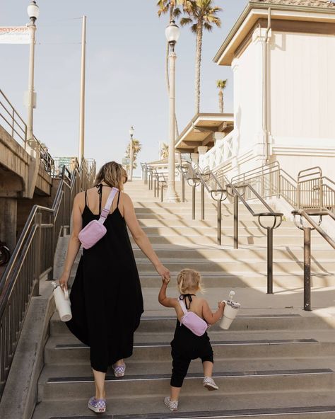 Can we talk about how cute this mama and daughter are?! I bet your little one will LOVE to copy mommy too!! Accessorize your matching outfits with our belt bags and tumblers for the perfect fit. 🥰 Check out our Mama and Mini matching collection on our website CUTIESLINE.CO #mommyandme #mommyandmefashion #mommy #mom #matchingoutfits #matchingwithmommy #matchingwithdaughter #beltbags #tumbler