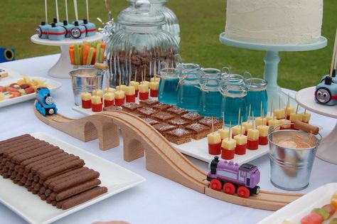 Thomas the tank engine dessert table. Blue Jelly cups. Train track Thomas Tank Engine, Train Birthday Theme, Train Party Decorations, Thomas Birthday Parties, Thomas Cakes, Thomas The Train Birthday Party, Thomas The Train Party, Thomas Birthday, Jelly Cups